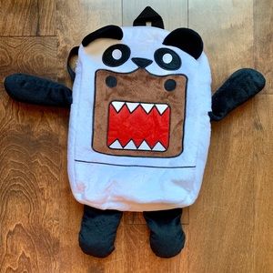 The Plush Domo Panda Backpack from Hot Topic.